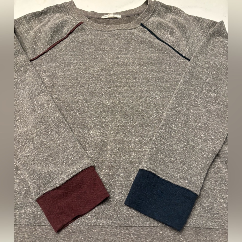 Threads 4 Thought women’s sweatshirt.